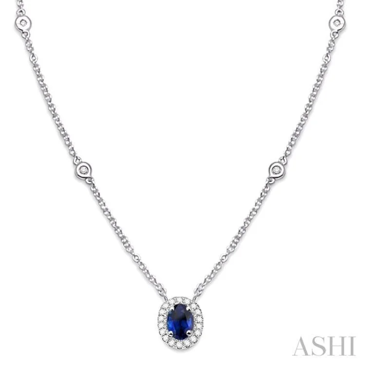 Ladies fashion chain necklace-6X4MM Oval Cut Sapphire and 1/6 Ctw Round Cut Diamond Necklace in 14K White Gold