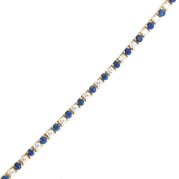 Ladies bracelet with charms-18K Yellow Gold Blue Sapphire and Diamond Tennis Bracelet